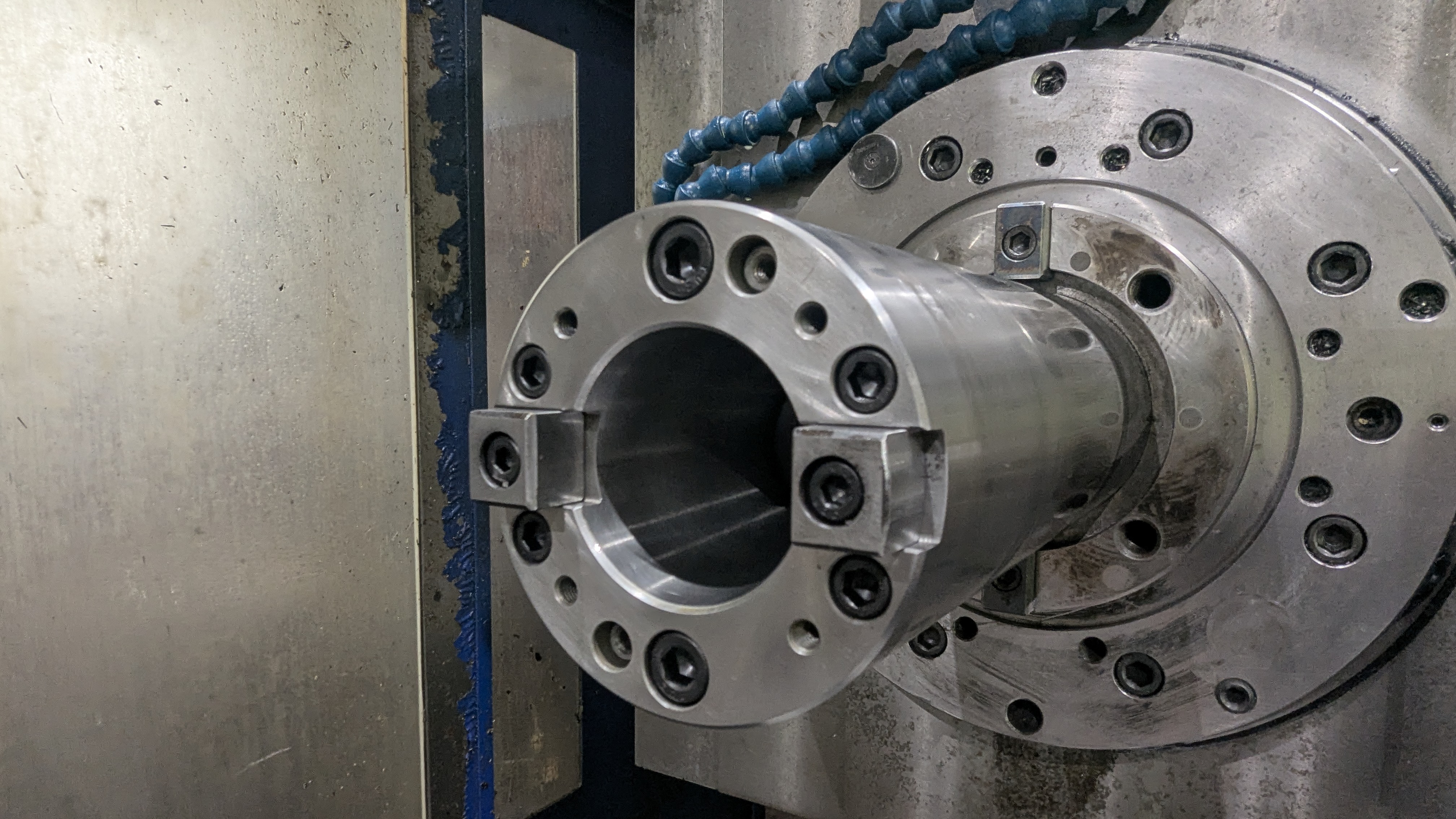 Locher machine-tool headstock opened for spindle rebuilding, showing internal components in context.